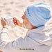KI-generiertes Bild,Stylische Mütze Unisex "Be Happy" Beige Jersey Stretch Beanie weich dehnbar